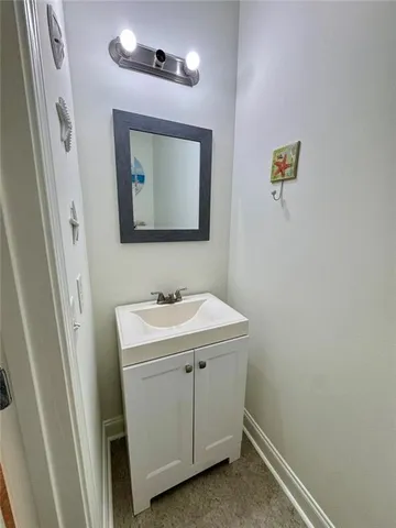 a view of living room with furniture and window