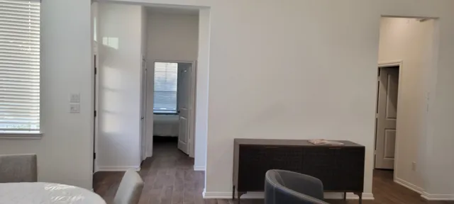 a view of livingroom with furniture and wooden floor