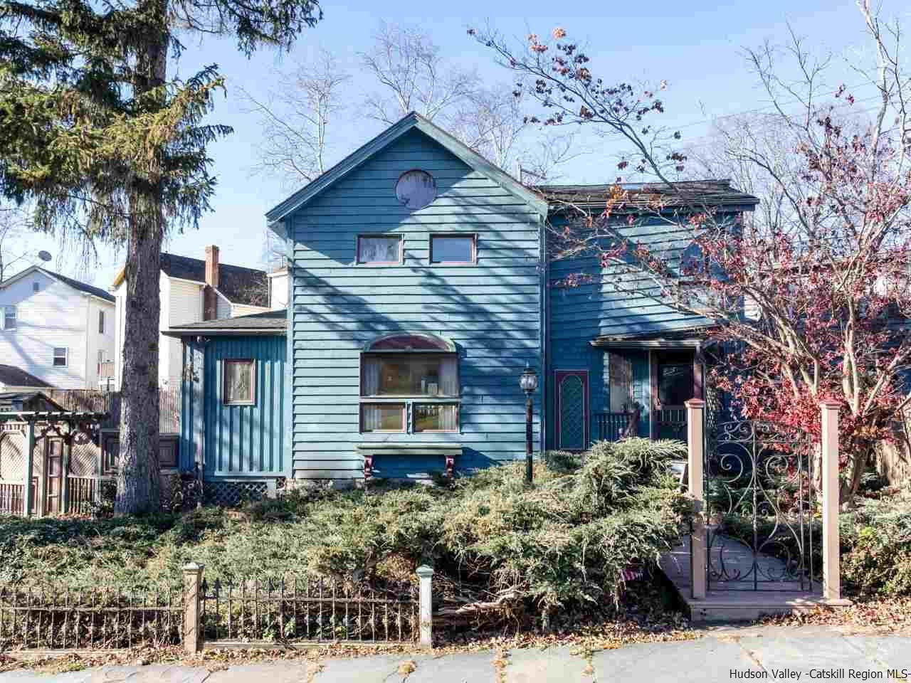 111 Spring Street Catskill, NY 12414 - Photo 1 of 28 a front view of a house with garden