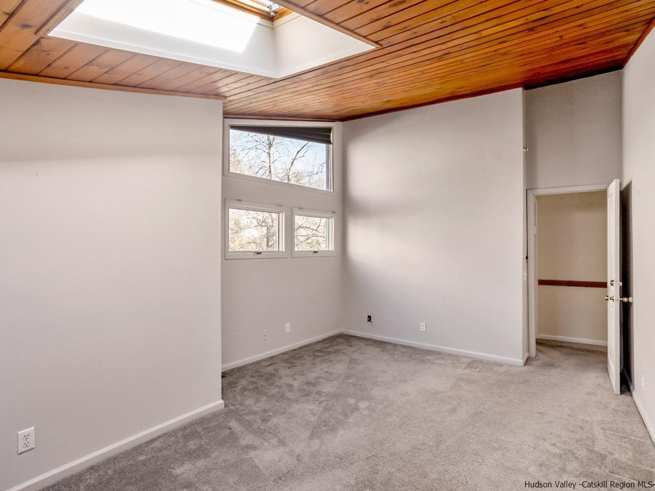 111 Spring Street Catskill, NY 12414 - Photo 11 of 28 a view of an empty room with a window
