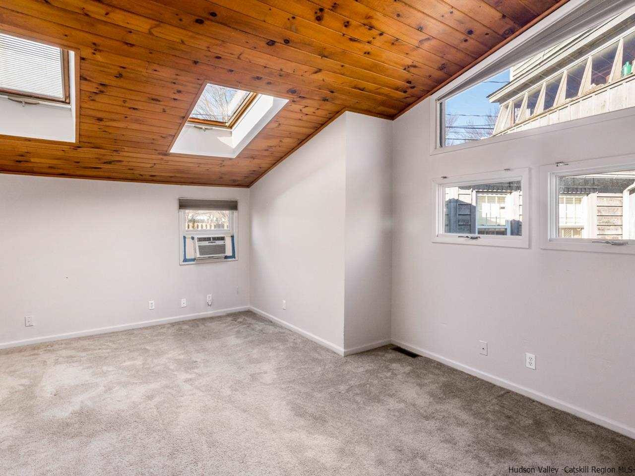 111 Spring Street Catskill, NY 12414 - Photo 12 of 28 an empty room with windows