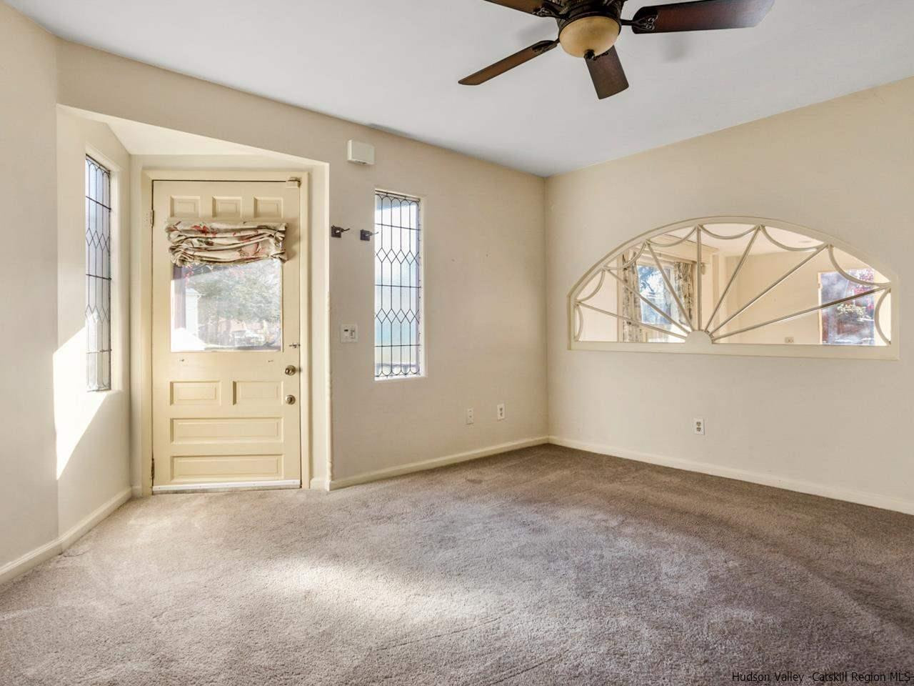 111 Spring Street Catskill, NY 12414 - Photo 20 of 28 a view of an empty room with a window