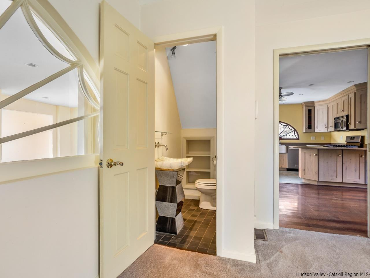 111 Spring Street Catskill, NY 12414 - Photo 22 of 28 view of living room with furniture and a view of kitchen