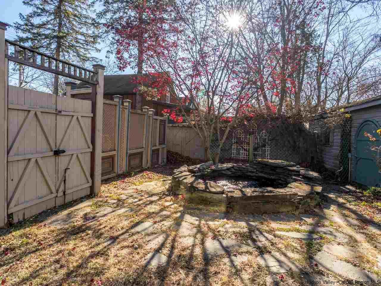 111 Spring Street Catskill, NY 12414 - Photo 26 of 28 a backyard of a house with shaded area