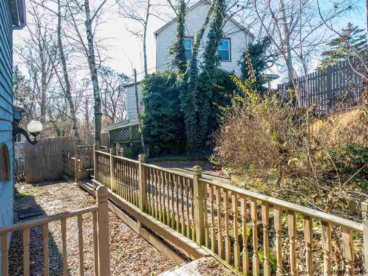 111 Spring Street Catskill, NY 12414 - Photo 27 of 28 a view of a balcony with wooden fence