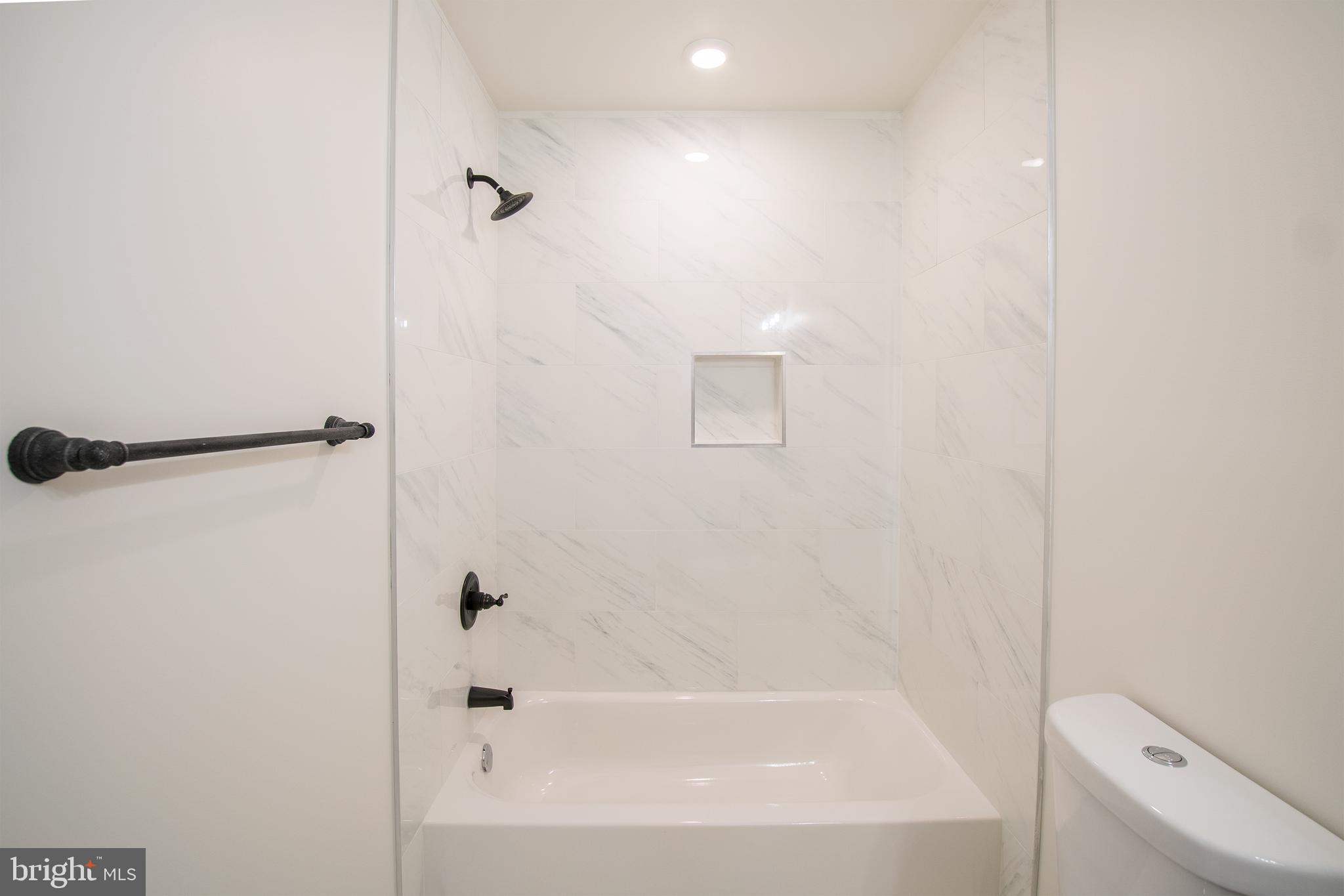 2022 North 5th Street, Unit 2 Philadelphia, PA 19122 - Photo 12 of 23 a bathroom with a bathtub