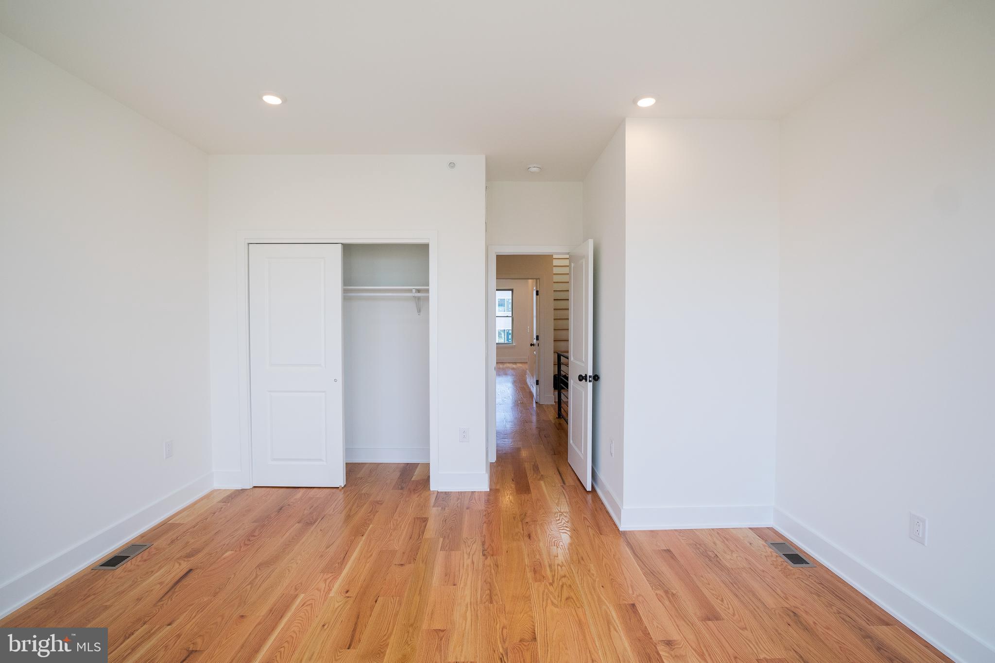 2022 North 5th Street, Unit 2 Philadelphia, PA 19122 - Photo 16 of 23 a view of hallway with wooden floor
