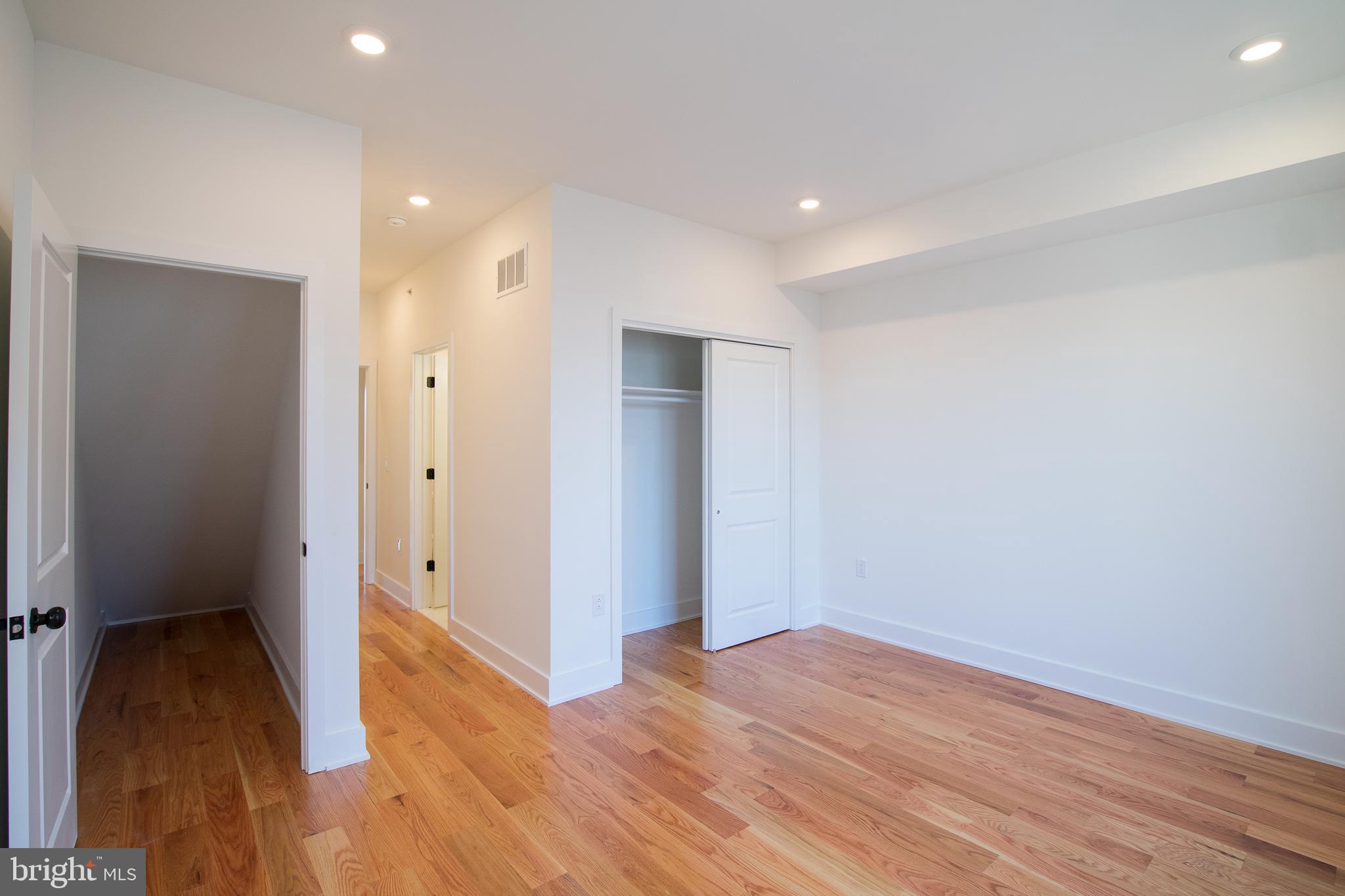 2022 North 5th Street, Unit 2 Philadelphia, PA 19122 - Photo 20 of 23 a view of hallway with wooden floor