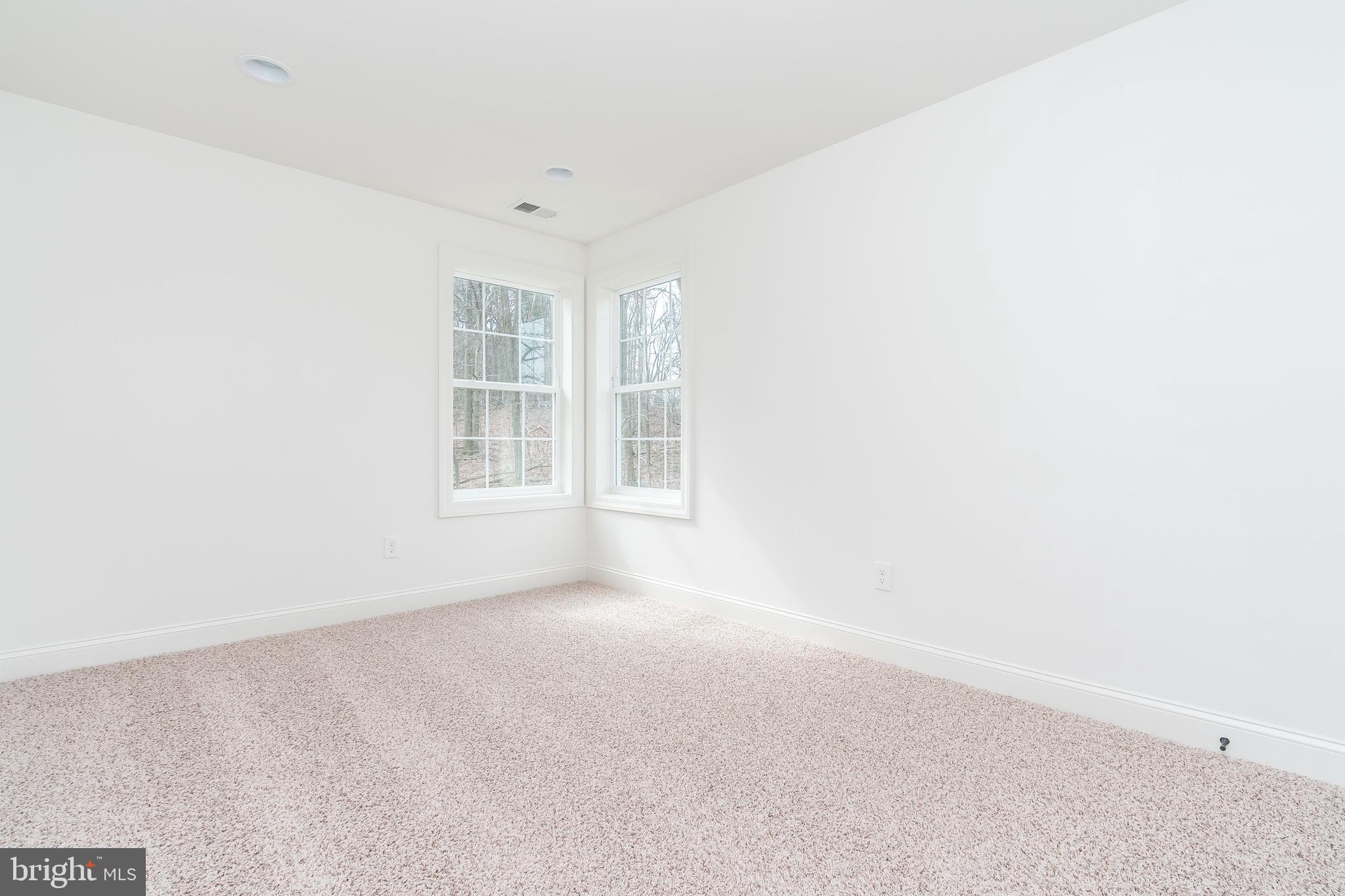 470 Queenstown Road Severn, MD 21144 - Photo 34 of 56 a view of an empty room with a window