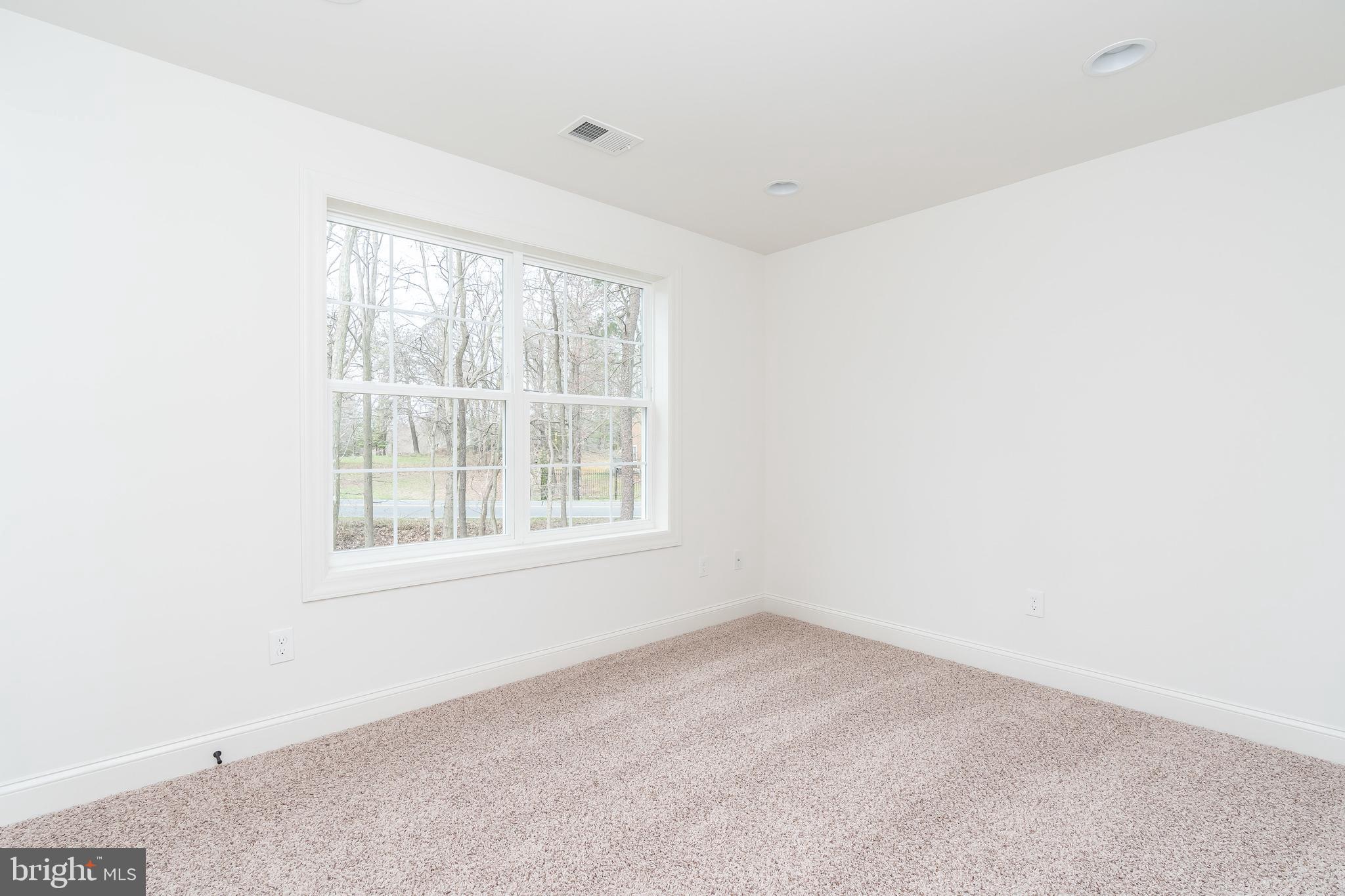 470 Queenstown Road Severn, MD 21144 - Photo 36 of 56 an empty room with a window