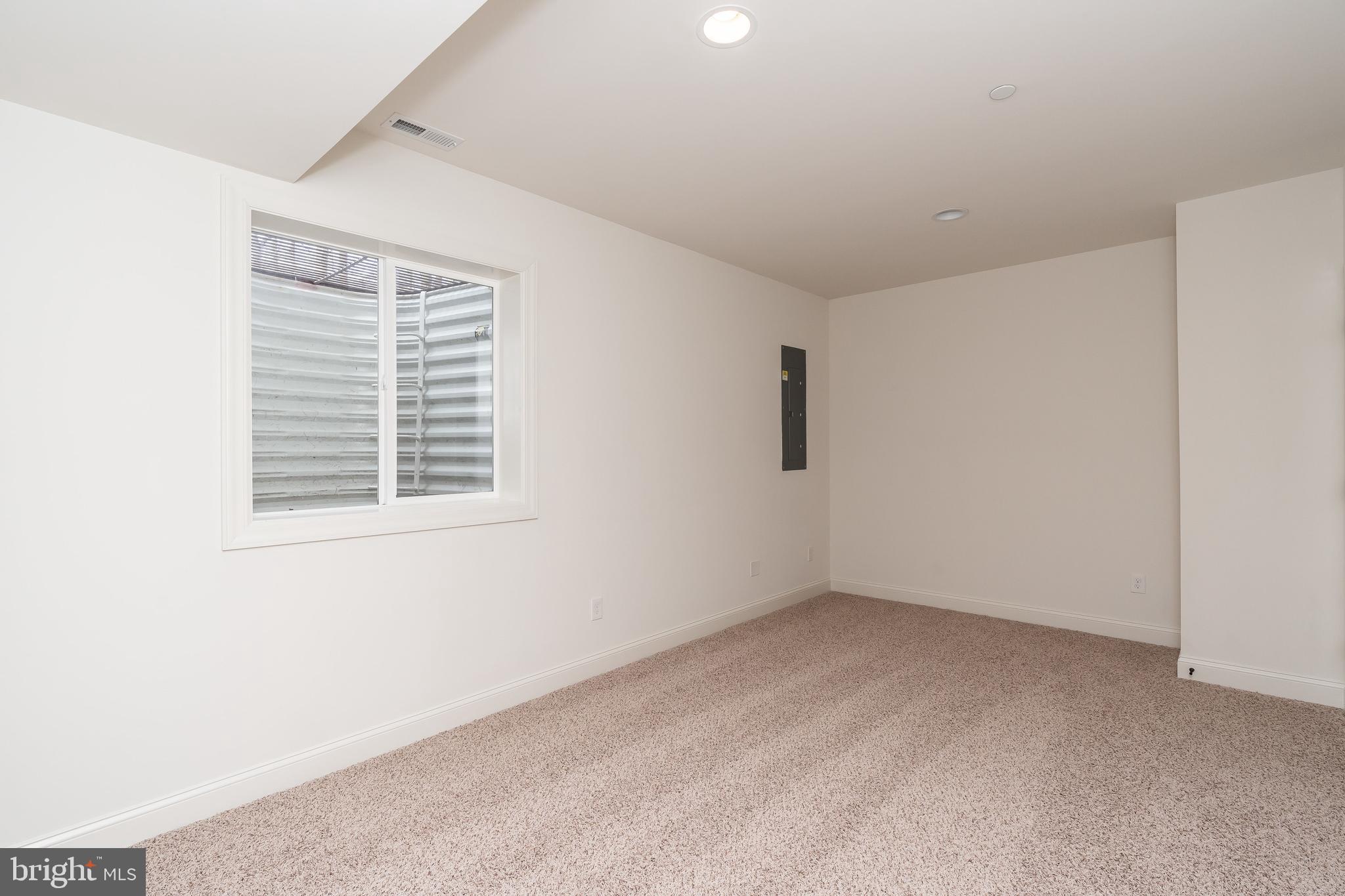 470 Queenstown Road Severn, MD 21144 - Photo 48 of 56 a view of an empty room with a window