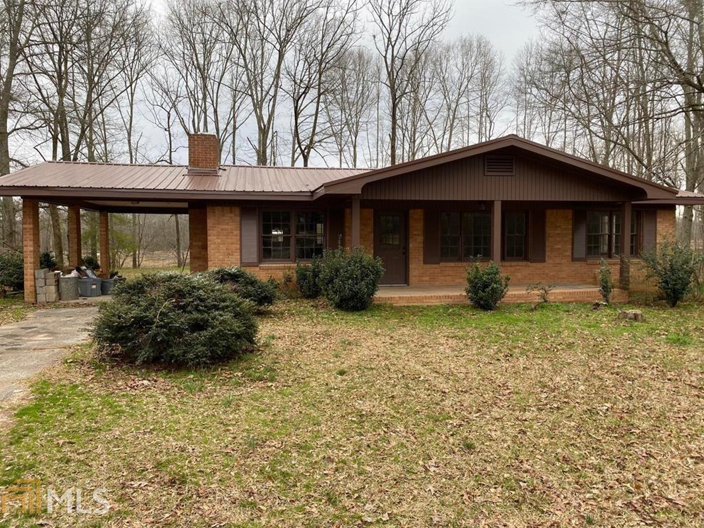 463 Spruill Bridge Road Temple, GA 30179 - Photo 1 of 1 a front view of a house with a yard