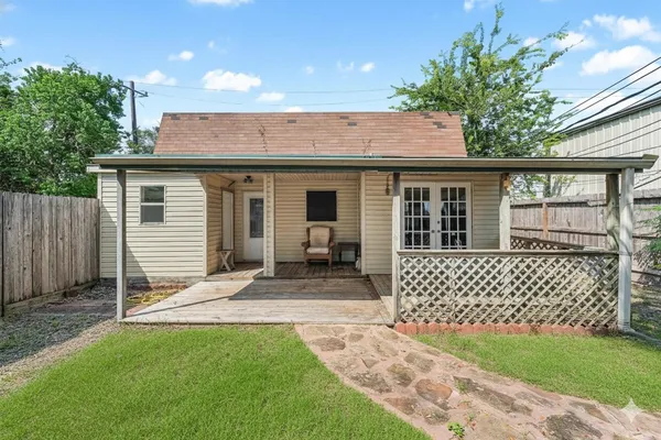 a house view with a backyard space