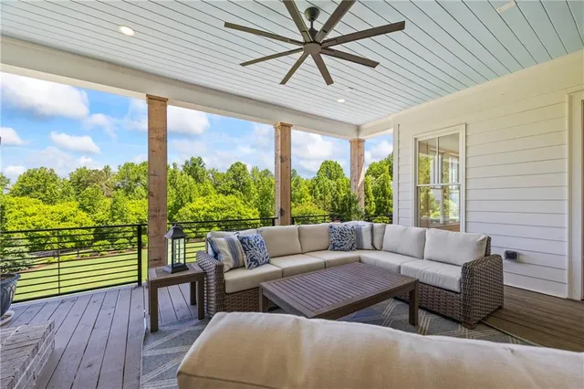 a view of yard with swimming pool and outdoor seating