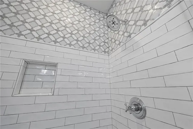 a view of a hallway with washer and dryer