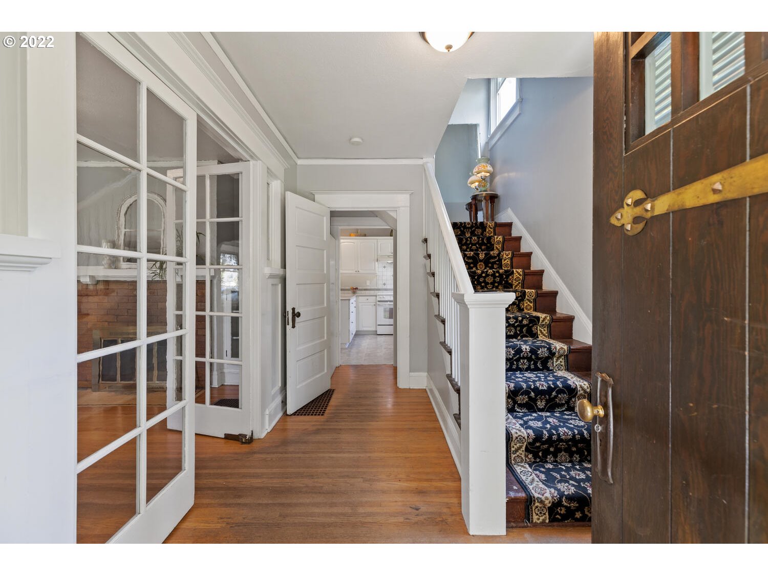 7307 Southwest Locust Street Portland, OR 97223 - Photo 4 of 32 a view of entryway with wooden floor