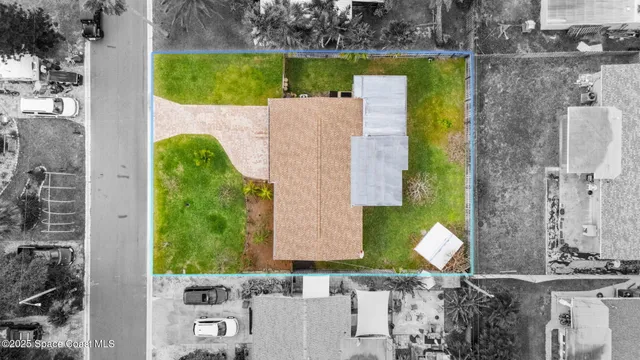 a view of swimming pool outdoor seating and yard