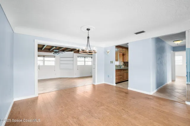 a view of a kitchen with a sink