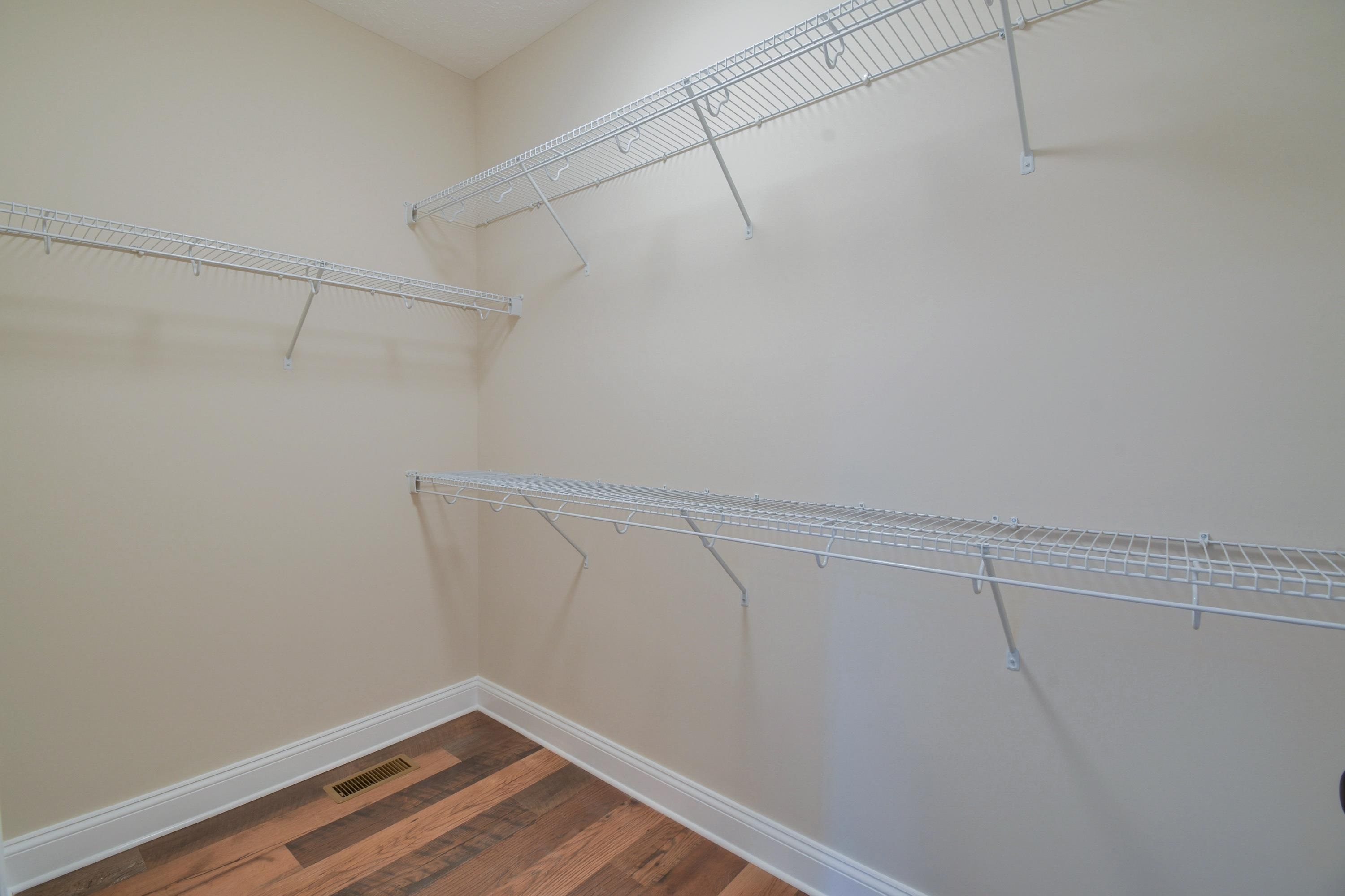 103 Fall Ridge Drive Stuarts Draft, VA 24477 - Photo 17 of 31 a view of a room with racks on the wall