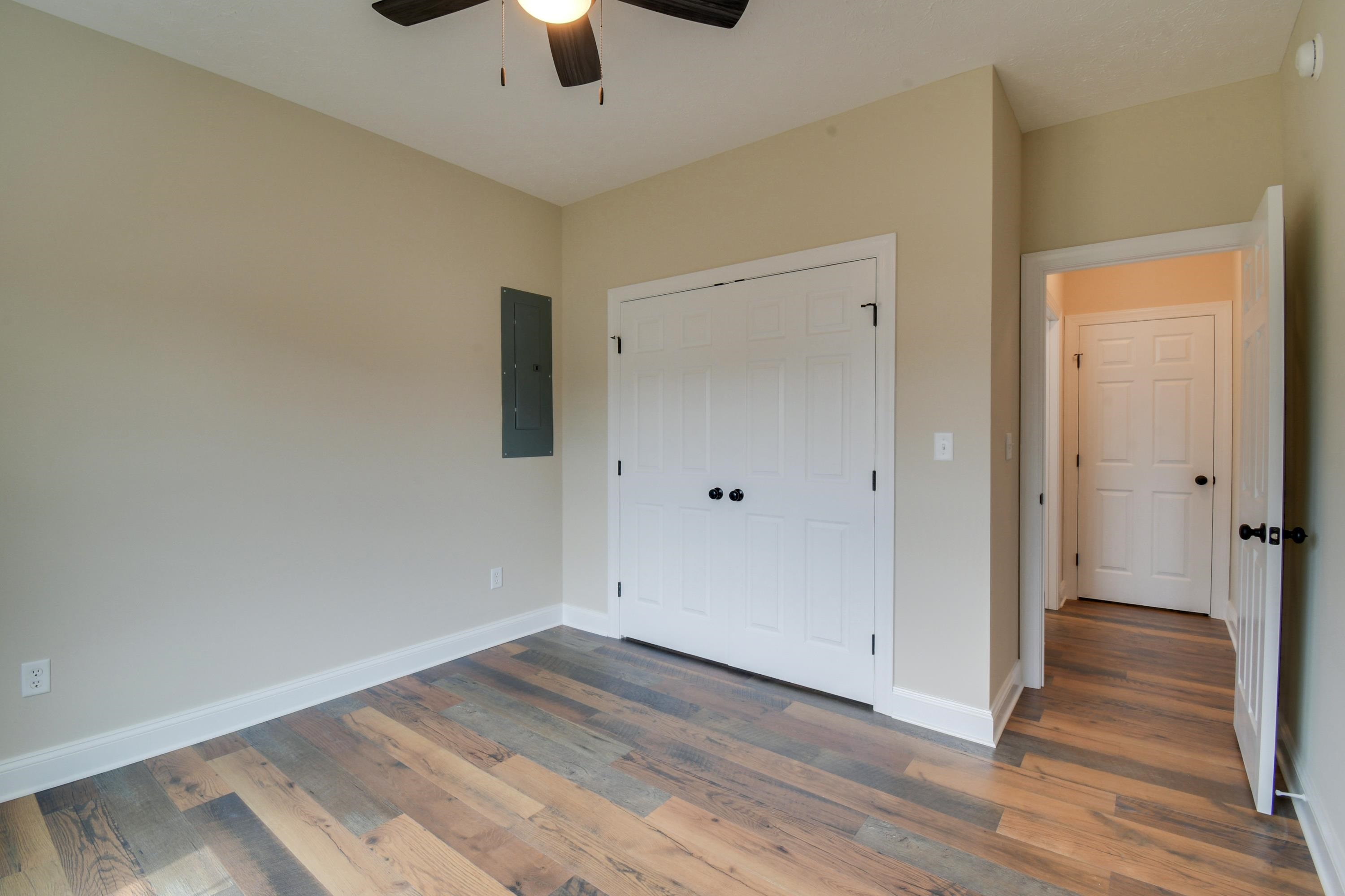 103 Fall Ridge Drive Stuarts Draft, VA 24477 - Photo 25 of 31 an empty room with wooden floor