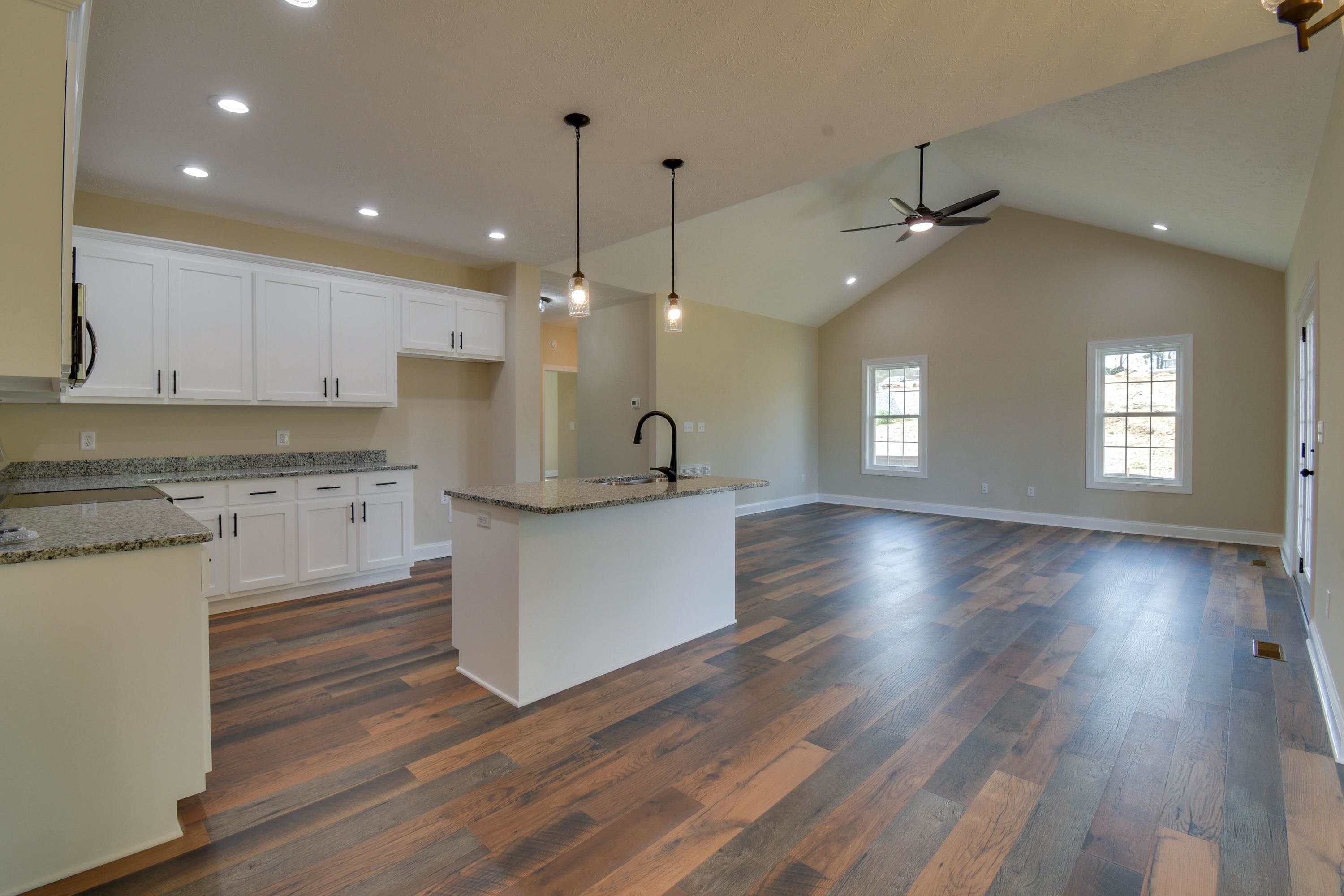 103 Fall Ridge Drive Stuarts Draft, VA 24477 - Photo 8 of 31 a large kitchen with hardwood floor a window and view living room