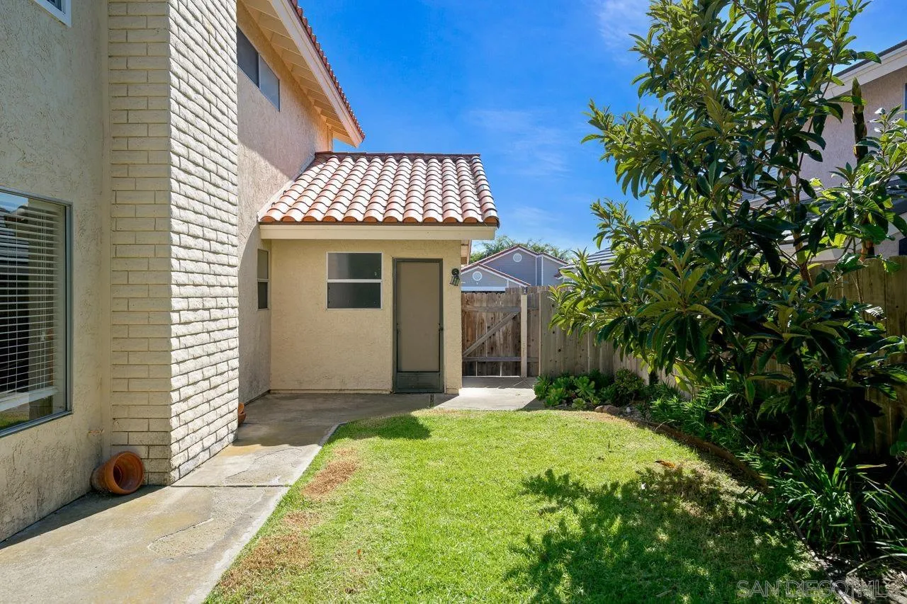 1908 Hummock Lane Encinitas, CA 92024 - Photo 5 of 29 a front view of a house with a yard