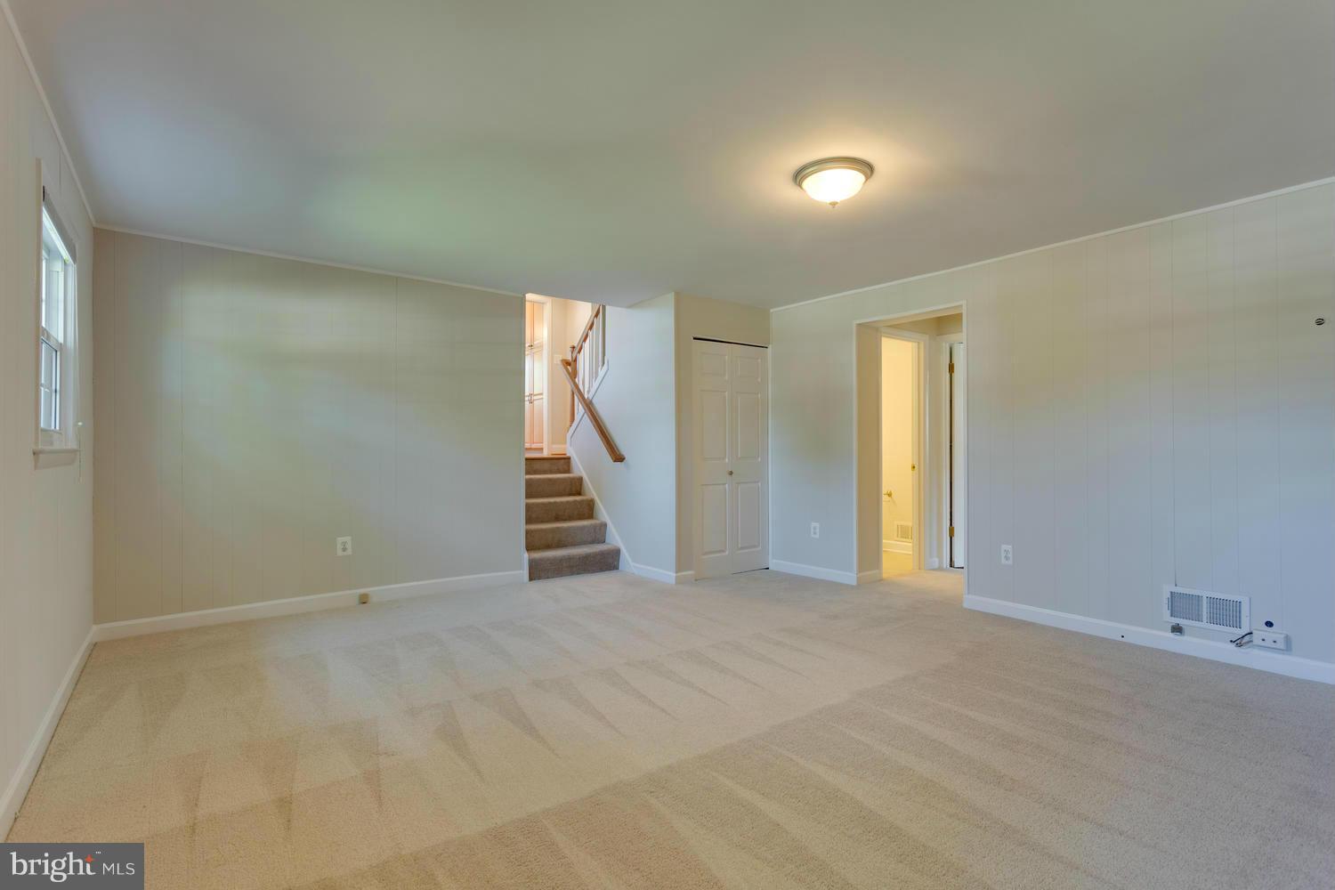 6003 Meriwether Lane Springfield, VA 22150 - Photo 24 of 30 a view of an empty room with stairs