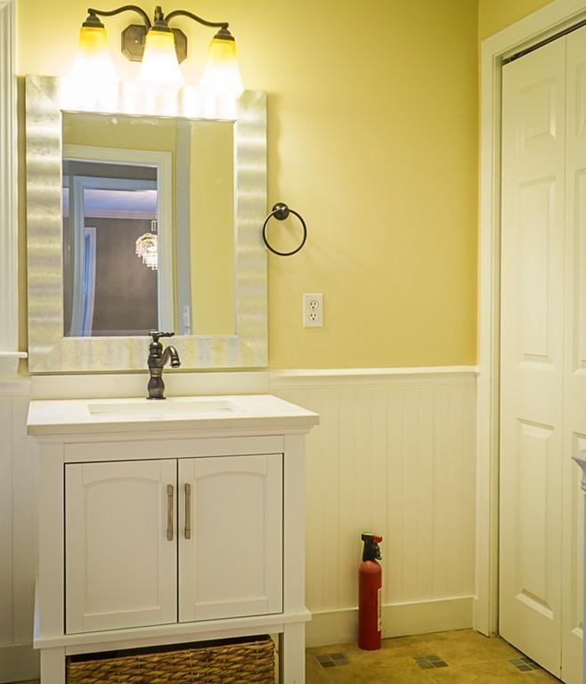 262 North Woodstock Road Southbridge, MA 01550 - Photo 13 of 25 a bathroom with a sink and a mirror