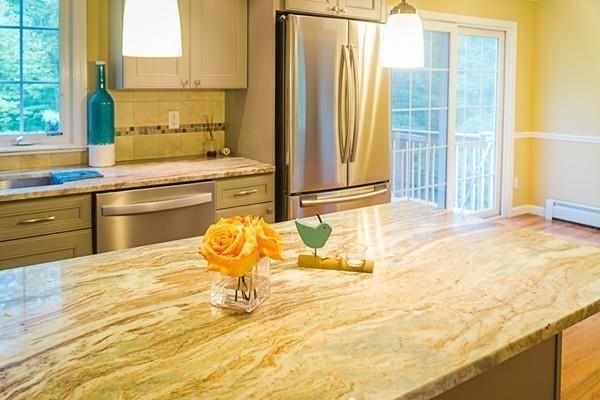 262 North Woodstock Road Southbridge, MA 01550 - Photo 8 of 25 a bathroom with a granite countertop sink and a large window