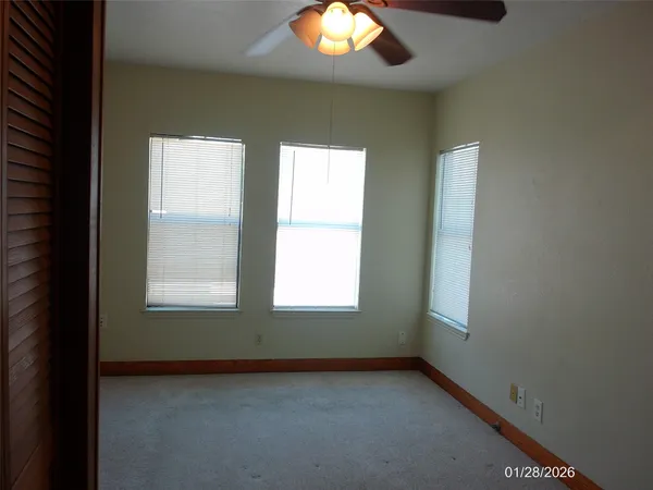 a window in an empty room with a window