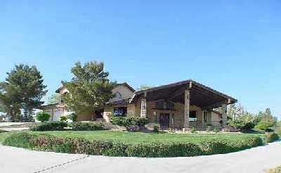 19558 Shoshonee Road Apple Valley, CA 92307 - Photo 1 of 1 a house view with a garden space