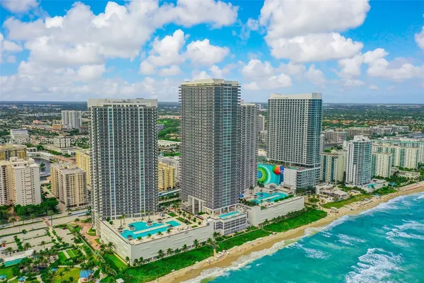 a view of a city with tall buildings