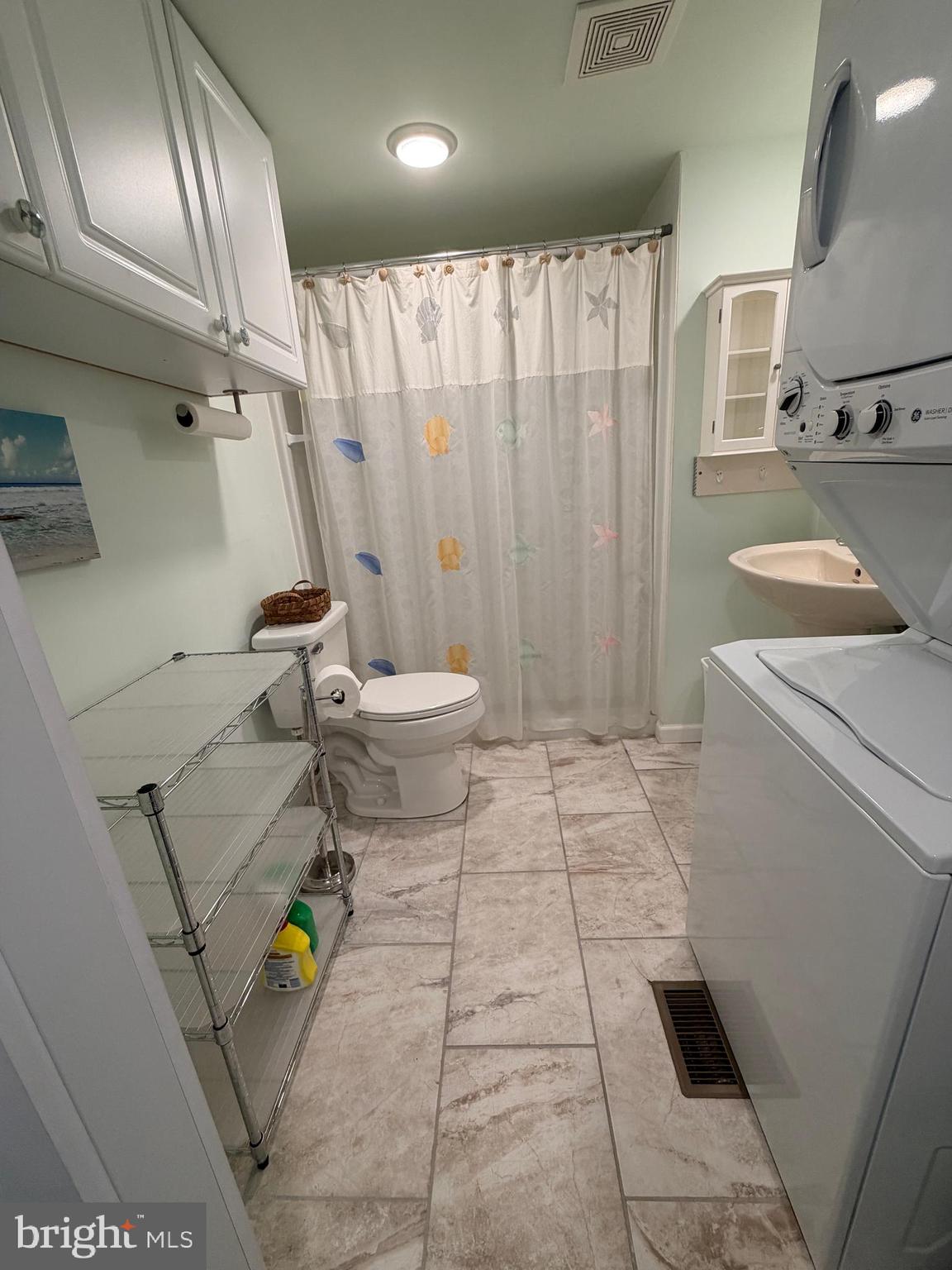 38019 Rabbit Road Ocean View, DE 19970 - Photo 19 of 51 a bathroom with a toilet and a shower