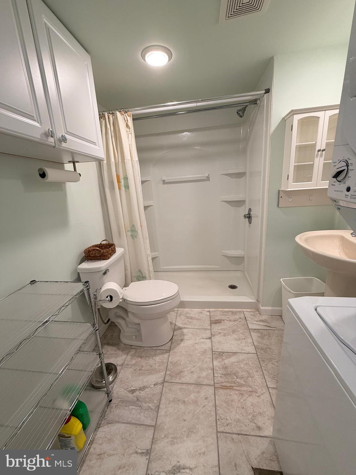 38019 Rabbit Road Ocean View, DE 19970 - Photo 25 of 51 a bathroom with a toilet and a shower