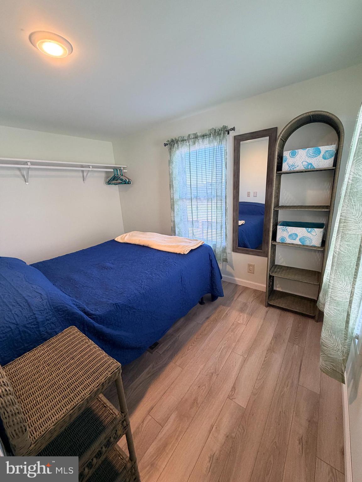 38019 Rabbit Road Ocean View, DE 19970 - Photo 31 of 51 a bedroom with bed and window