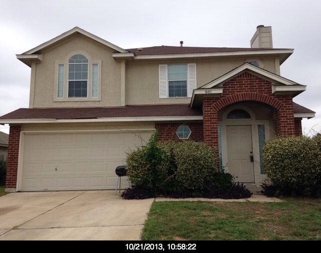 601 Los Robles Road Leander, TX 78641 - Photo 1 of 1 a front view of a house with garden