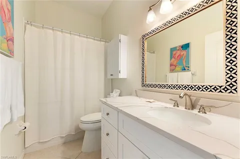 a bed room with a bed and furniture