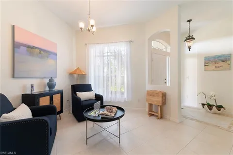 a kitchen with stainless steel appliances granite countertop a sink stove and microwave