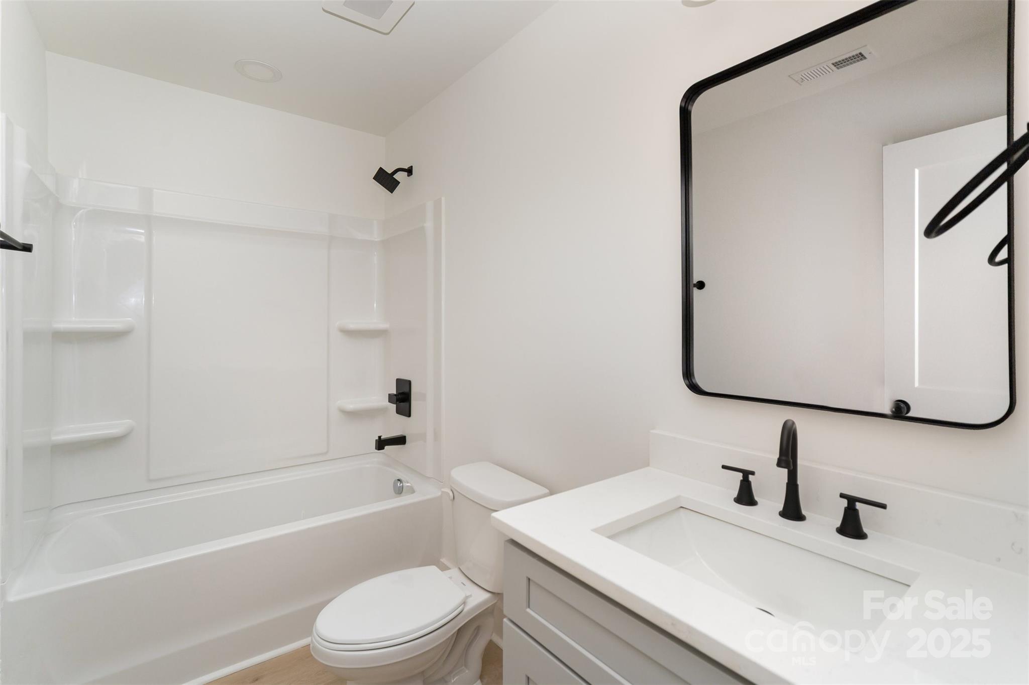 604 6th St Court Northwest Conover, NC 28613 - Photo 24 of 31 a bathroom with a sink toilet and a bathtub