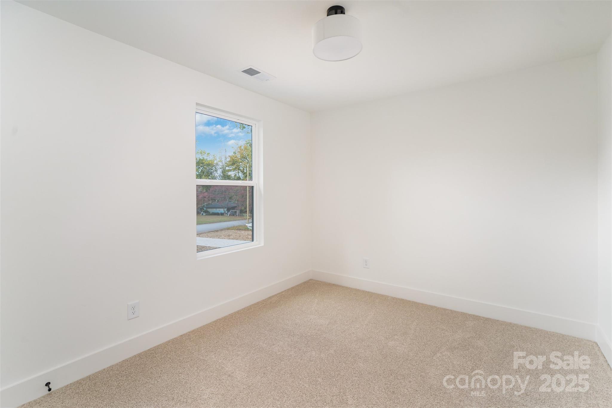 604 6th St Court Northwest Conover, NC 28613 - Photo 25 of 31 an empty room with a window