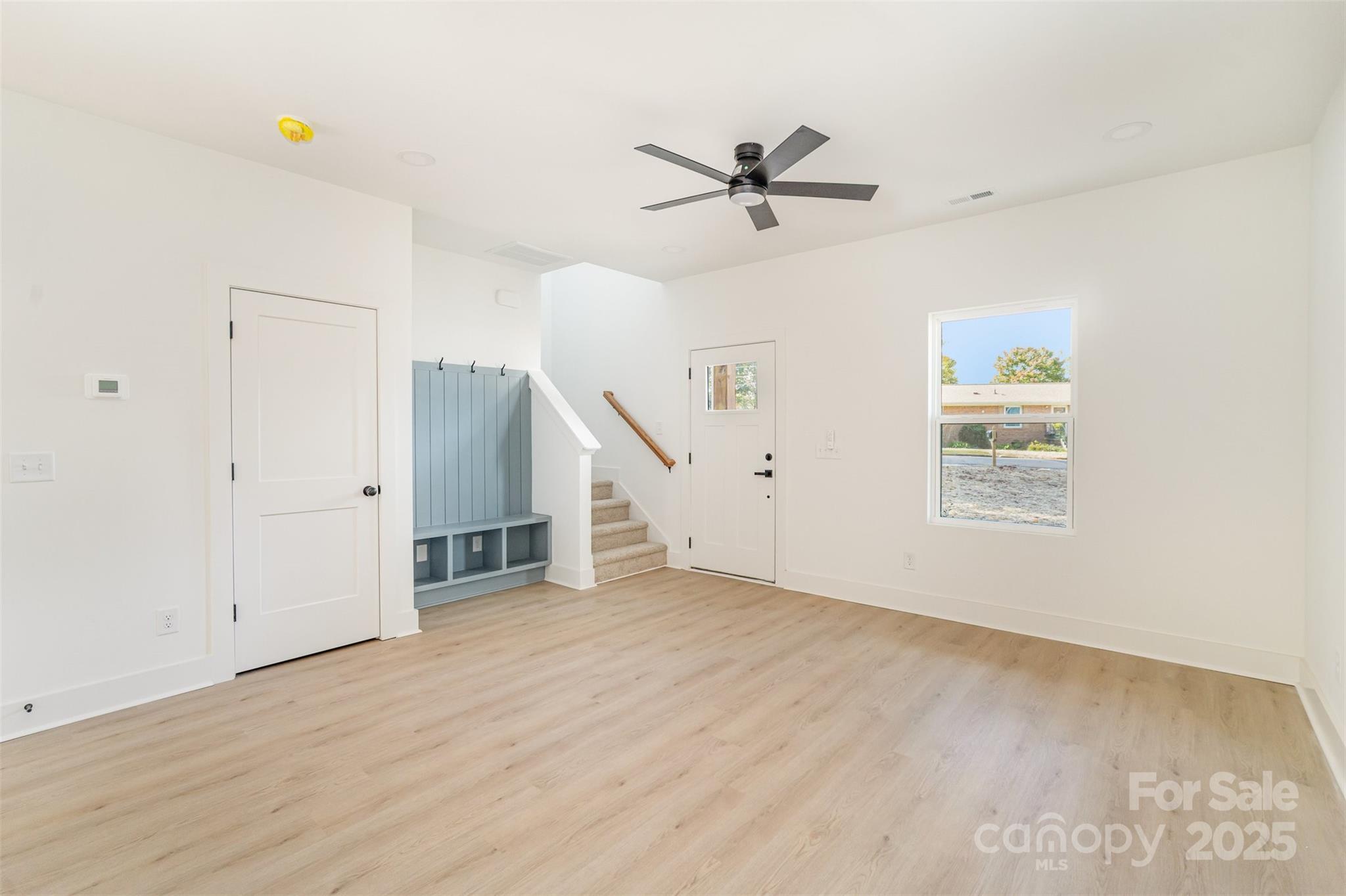 604 6th St Court Northwest Conover, NC 28613 - Photo 7 of 31 a view of a livingroom with a ceiling fan and window