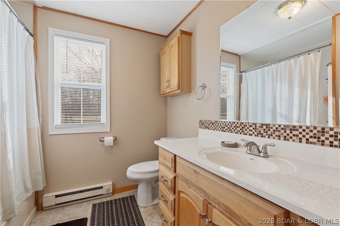 31048 Broken Circle Road Stover, MO 65078 - Photo 26 of 59 upper level full bath with tub/shower combo & tile