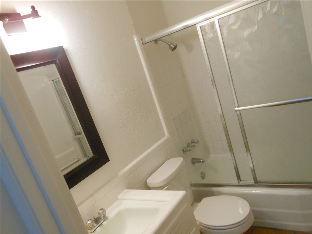 Undisclosed Address Austin, TX 78704 - Photo 14 of 16 a bathroom with a toilet and a shower