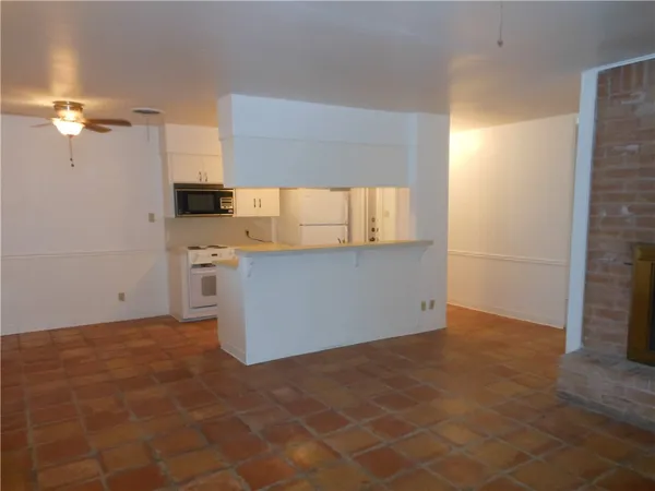 a view of a kitchen with a sink
