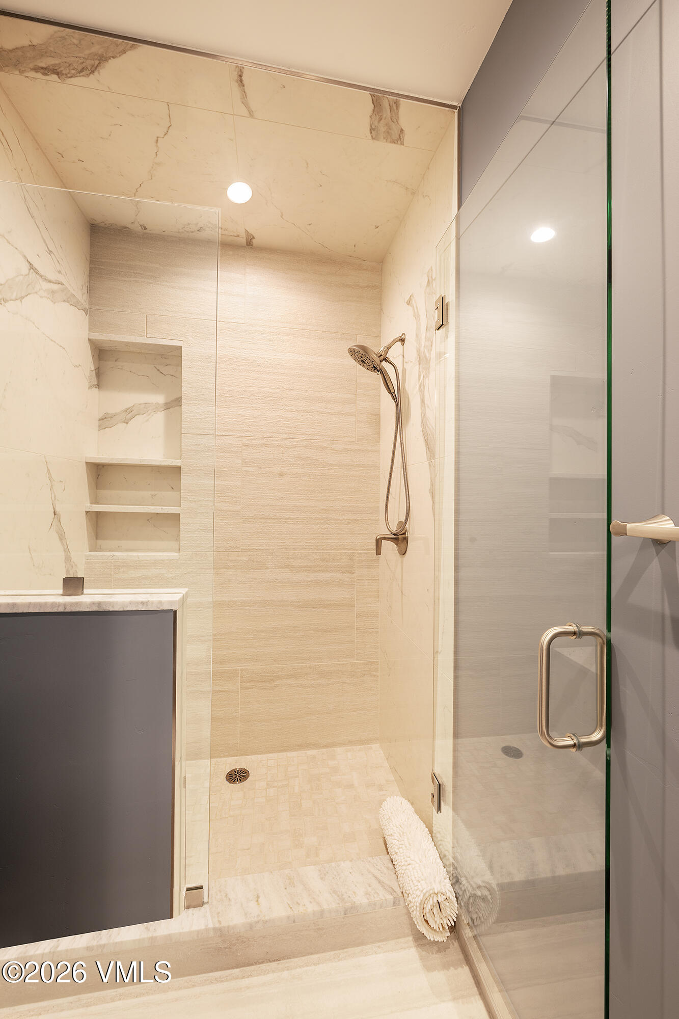5205 Long Sun Lane Avon, CO 81620 - Photo 16 of 35 a bathroom with a shower