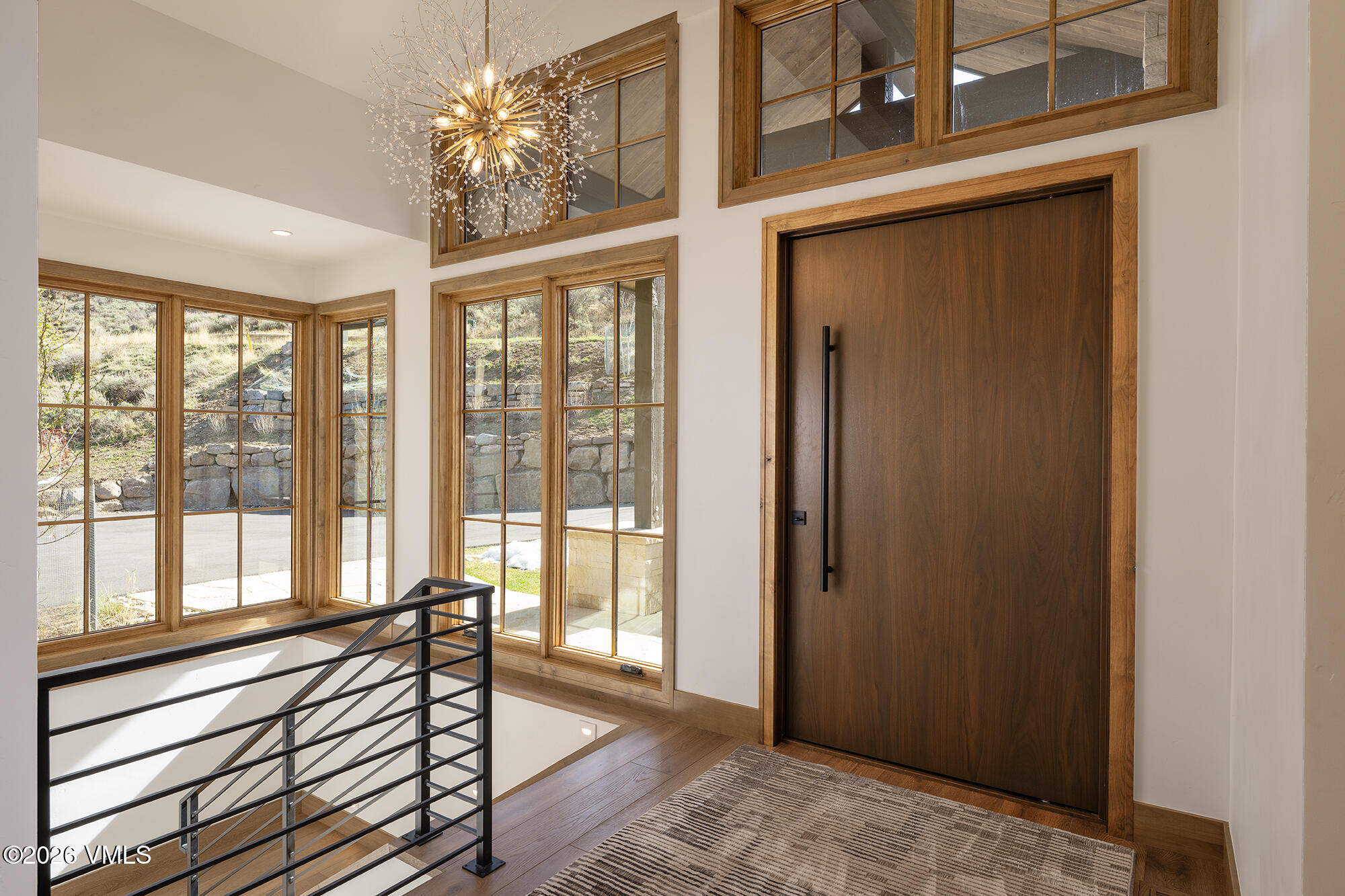 5205 Long Sun Lane Avon, CO 81620 - Photo 20 of 35 a view of an entryway with a chandelier