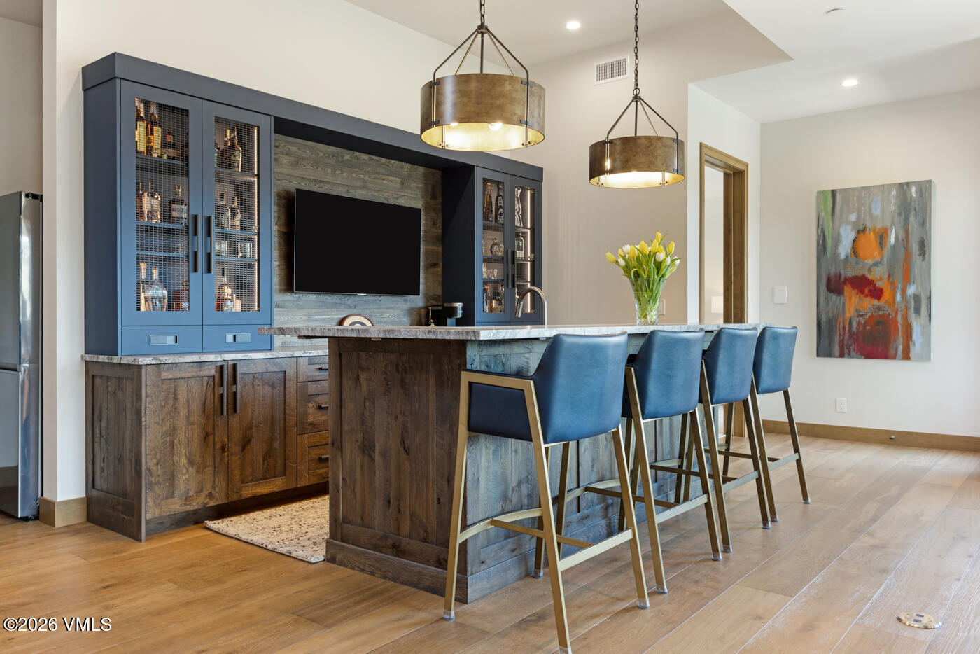 5205 Long Sun Lane Avon, CO 81620 - Photo 23 of 35 a view of a dining room with furniture and wooden floor