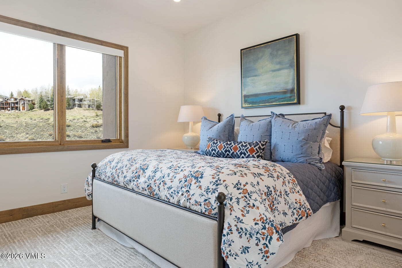 5205 Long Sun Lane Avon, CO 81620 - Photo 29 of 35 a bedroom with a large bed and a window