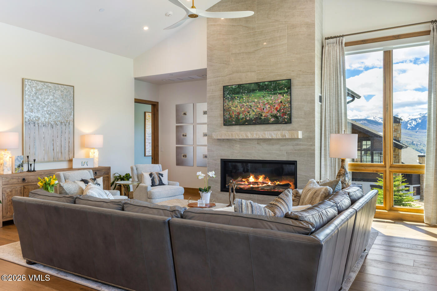 5205 Long Sun Lane Avon, CO 81620 - Photo 9 of 35 a living room with furniture and a fireplace