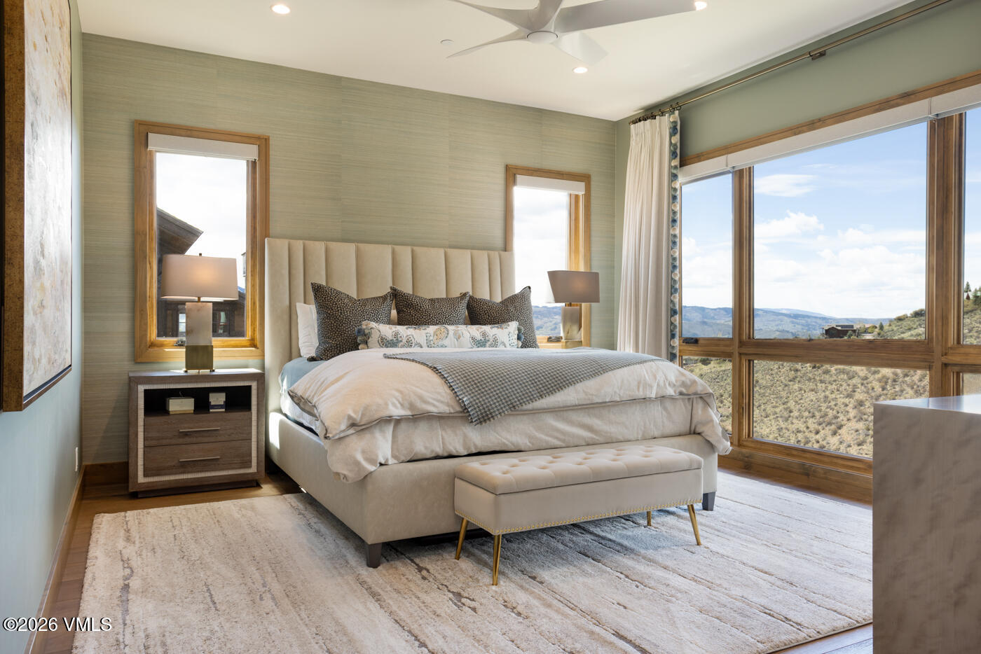 5205 Long Sun Lane Avon, CO 81620 - Photo 10 of 35 a bedroom with a bed and a large window